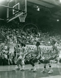 Gene Phillips Drives For Basket